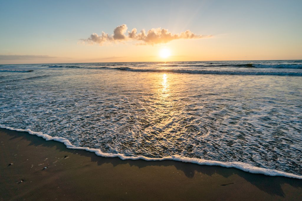 Sun rising over a beach in Norther Outer Banks