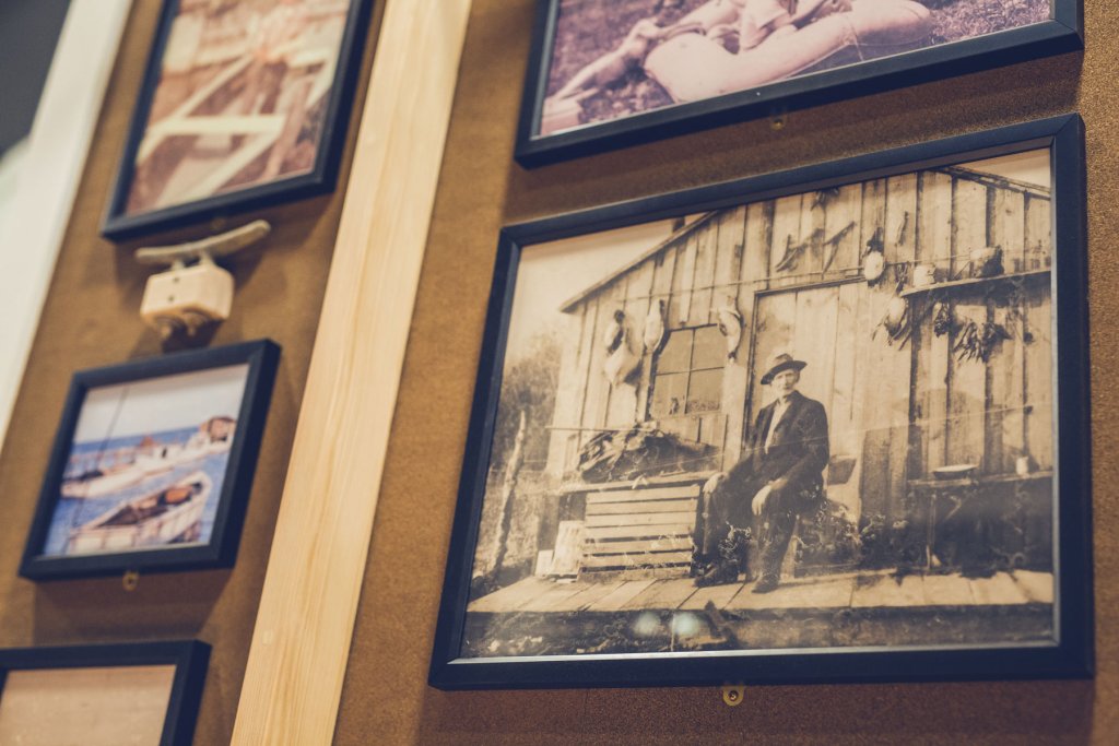 historic images hanging on wall in currituck maritime museum